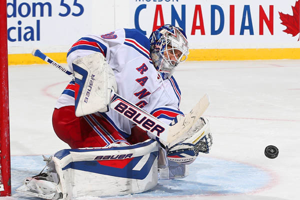 Henrik Lundqvist got his 302nd win as a Ranger to pass Mike Richter's wins record. (Andre Ringuette/Getty Images)